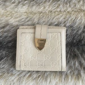 Gucci leather monogram wallet